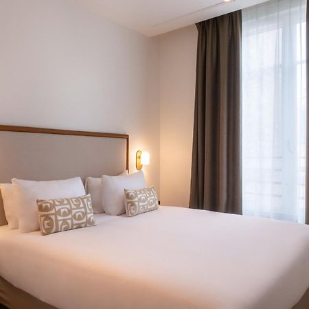 Le Lampika Hotel Párizs Szoba fotó